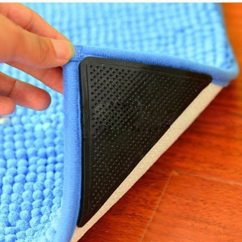 Coltare Antiaderente Pentru Fixarea Covoarelor Ruggies set 8 Buc