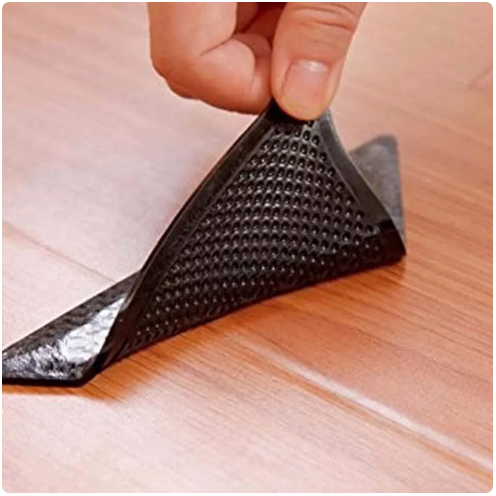 Coltare Antiaderente Pentru Fixarea Covoarelor Ruggies set 8 Buc